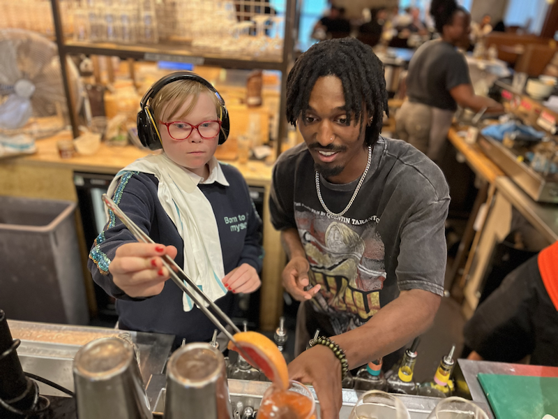 young person making a mocktail at eat club's hospitality kickstart course