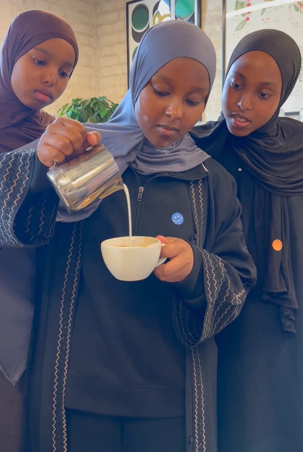 three girls doing their barista training as part of eat club's hospitality career course