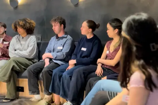 eat club's young leaders sitting in a circle